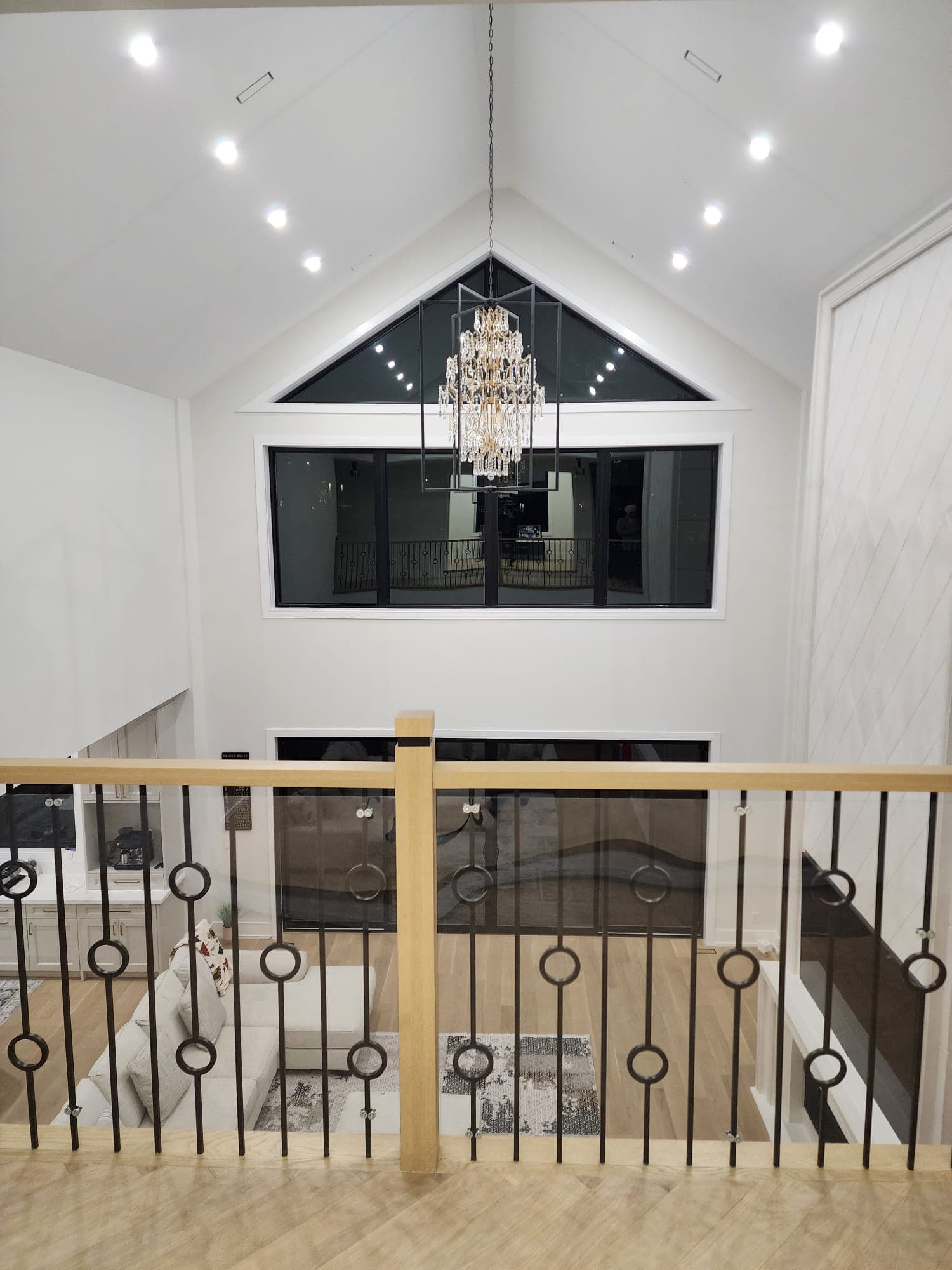 Custom home build with vaulted ceiling and crystal chandelier by Maple Custom Homes in Barrie Ontario