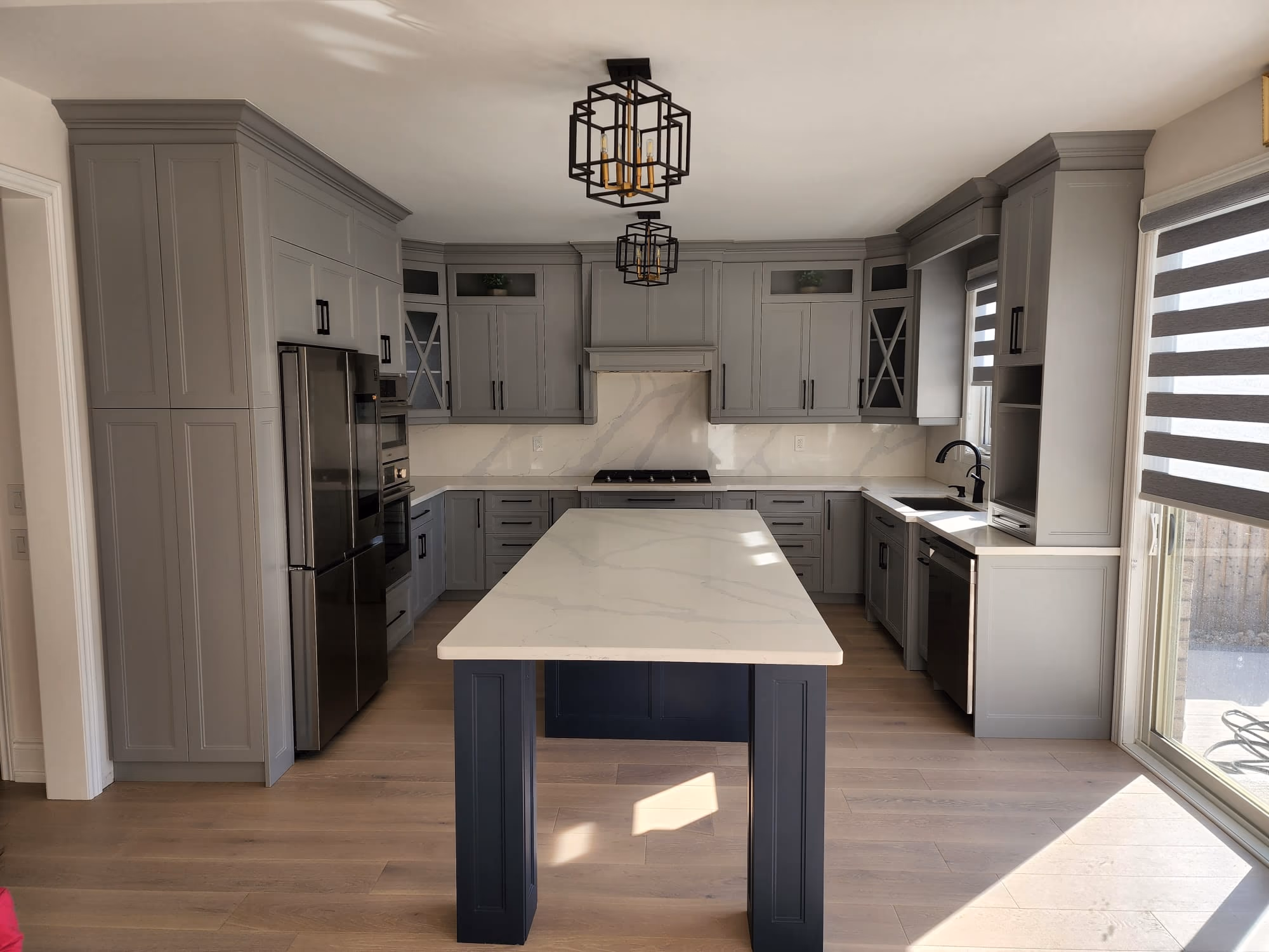 Modern kitchen after renovation by Maple Custom Homes GTA